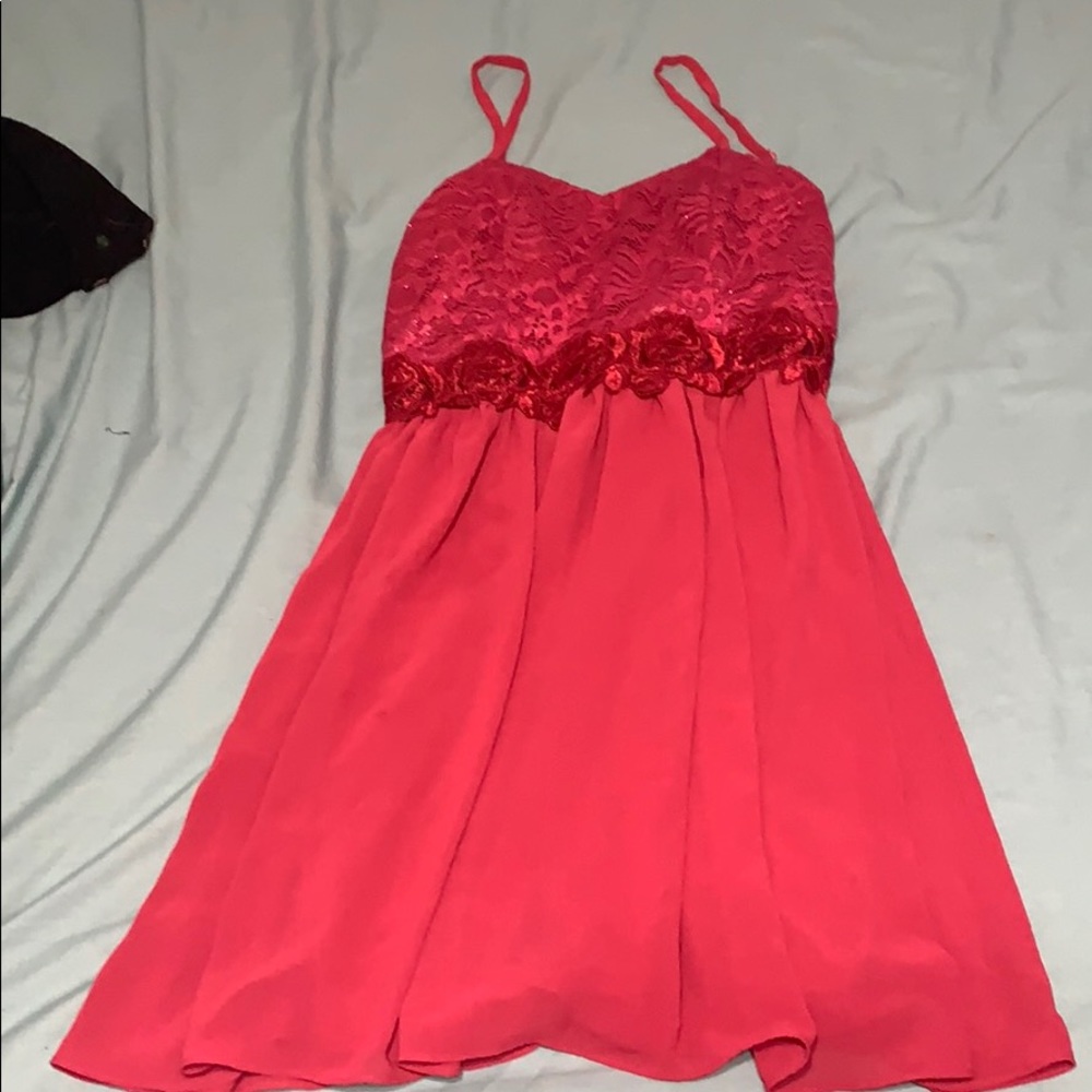 A bright pink dress.